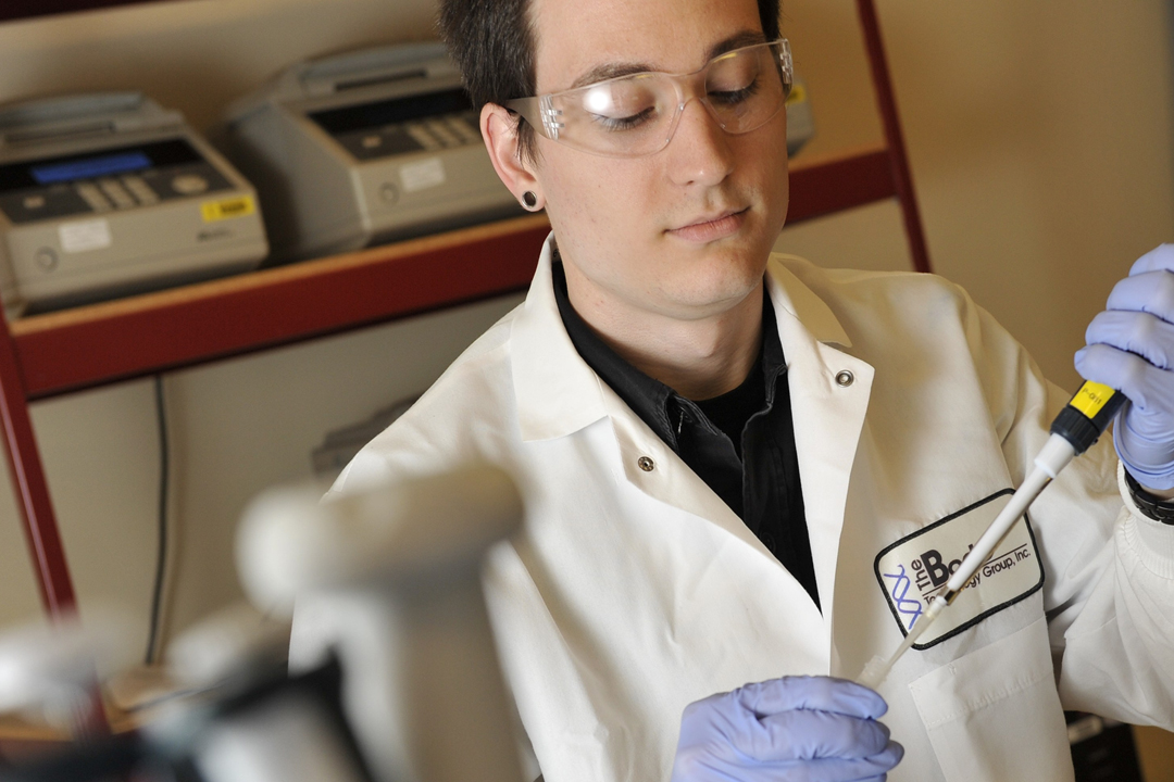 A Bode Technology Group employee performs forensic evaluation