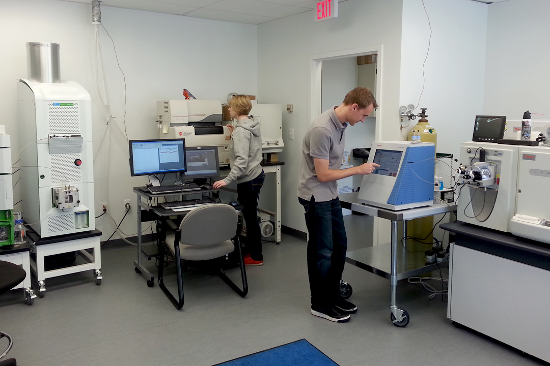 Two students working in the department's mass spectrometry lab.